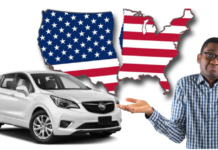 White 2019 Buick Envision with United States shaped flag divided and indecisive man