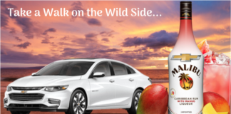 White 2019 Chevy Malibu and Malibu rum, mangos and glass in front of sunset