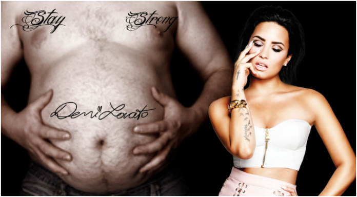 Large man with "Stay Strong" and "Demi Lovato" tattooed on chest, Demi Lovato holding face, on black background