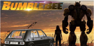 A black VW Golf with bumper sticker "tits or GTFO", Bumblebee transformer and woman silhouette in front of sunset