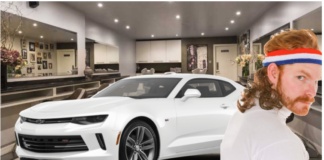 White 2019 Chevy Camaro in hair salon with man with mullet
