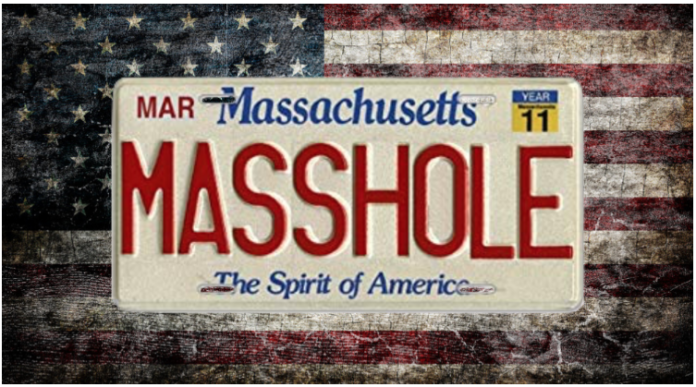 Weathered United States flag with Massachusetts license place reading "masshole"
