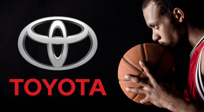 The Toyota logo on black with a basketball player