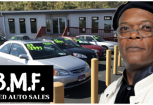 Samuel L Jackson in front of a used car dealership