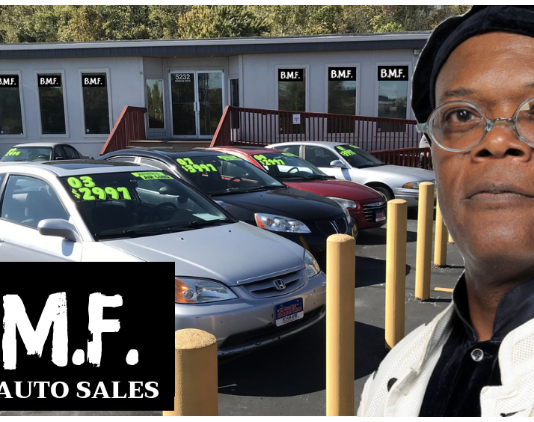 Samuel L Jackson in front of a used car dealership