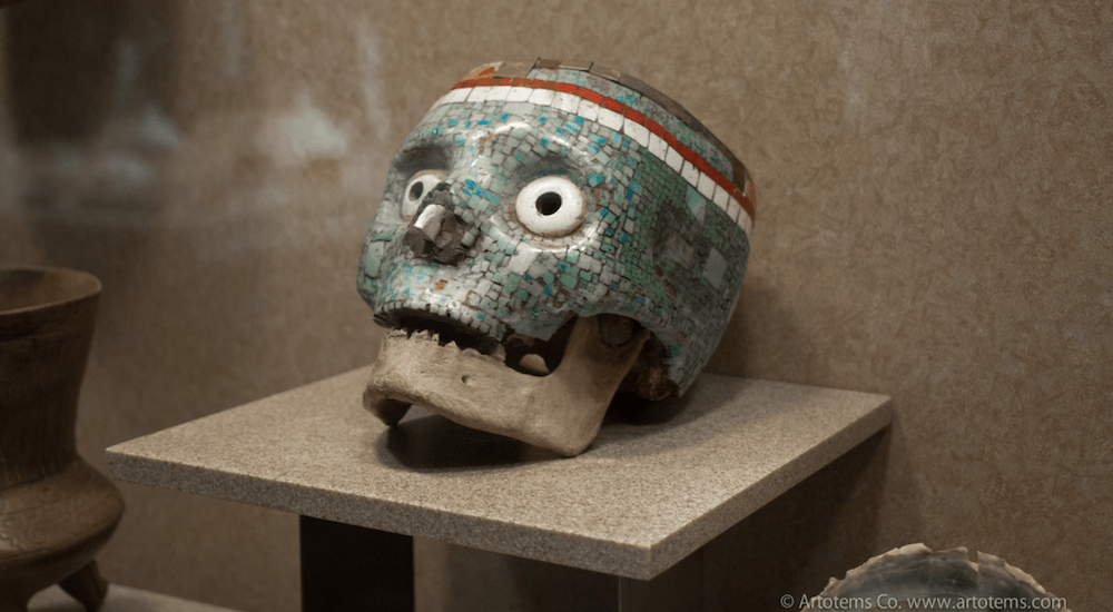 A mosaic styled skull with fake eyes is being displayed.