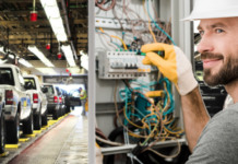 Electrician at a Ford factory in live auto news
