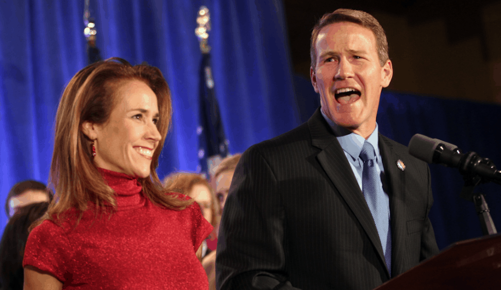 Jon Husted and wife during speech