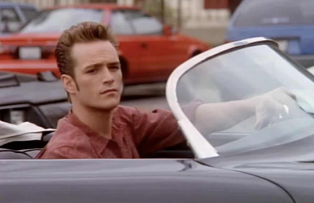 Luke Perry is shown driving the black convertible Porsche on 'Beverly Hills 90210'. In live auto news, that car may be up for auction.