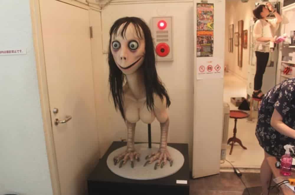 The sculpture of 'Mother Bird" that Momo is based on is shown.