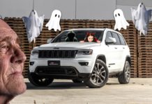 An old man's face is shown in front of a Jeep Grand Cherokee with haunted characters around it. He wishes he compared the 2019 Buick Enclave vs 2019 Jeep Grand Cherokee better.