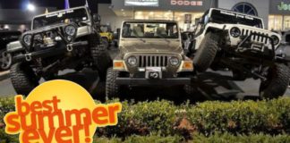 Three Wranglers are 'Jeep Stacking' by parking on the middle Jeep's tires at a dealership to promote new Jeep lease deals.