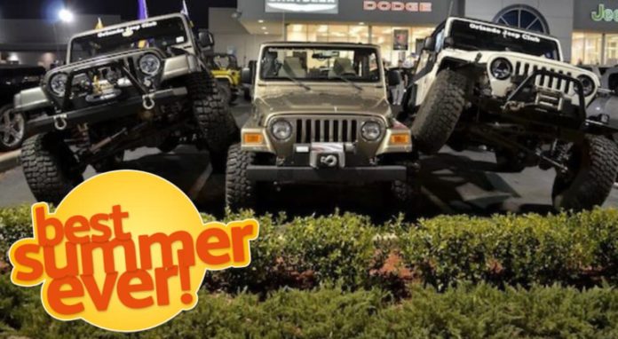 Three Wranglers are 'Jeep Stacking' by parking on the middle Jeep's tires at a dealership to promote new Jeep lease deals.
