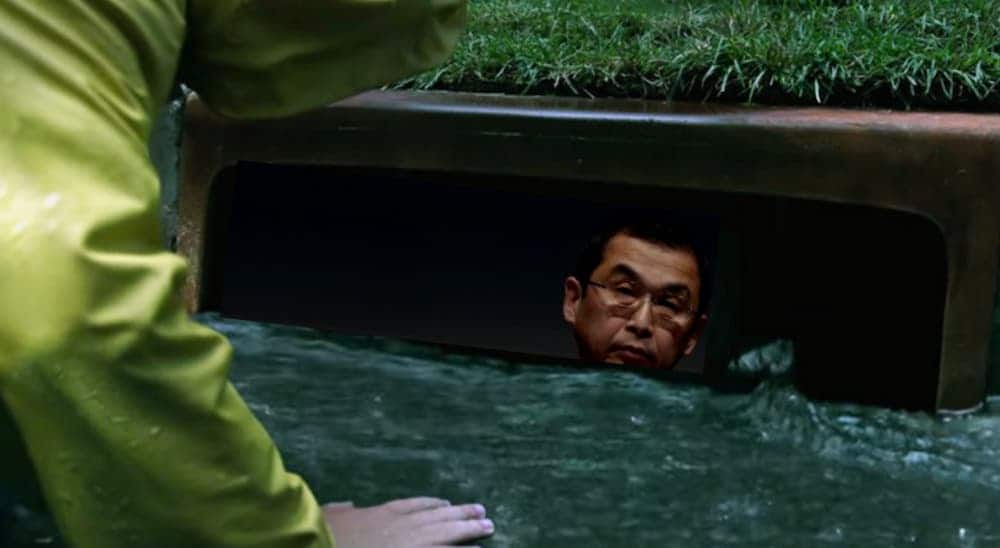 Shigehisa Takada is shown in a storm drain with Georgie looking in from the IT movie.