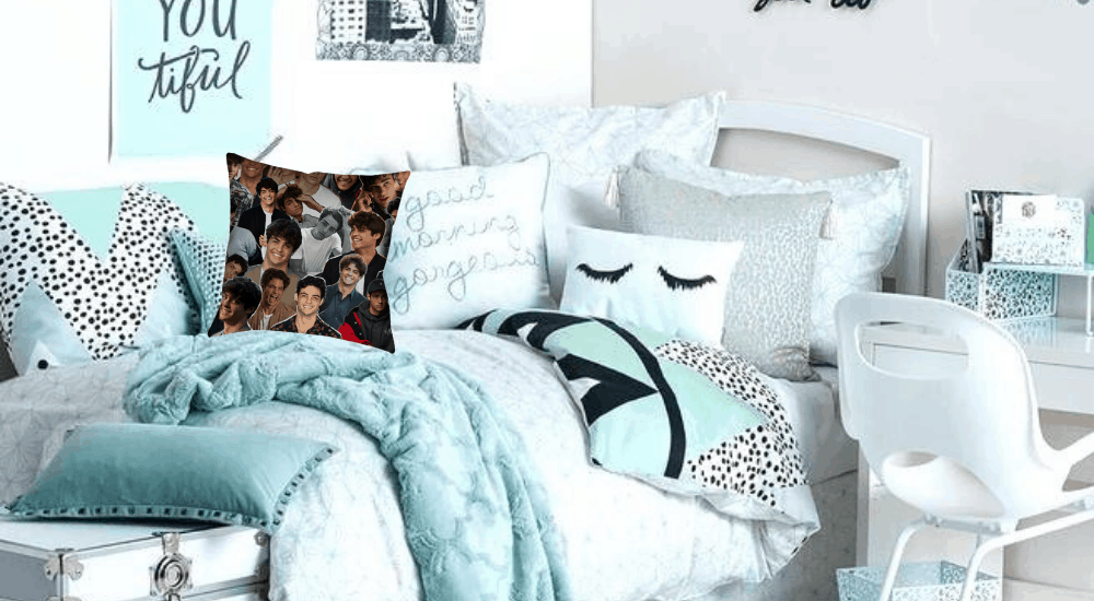 Teenage girls bedroom with printed pillow featuring a collage of actor / heartthrob Noah Centineo