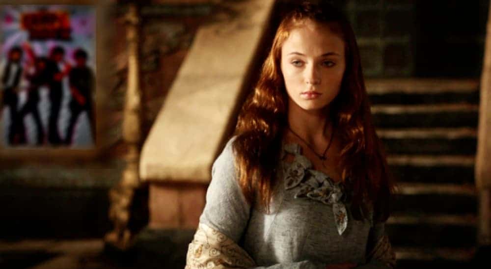 'Game of Thrones' Sansa Stark (played by Sophie Turner) is shown with an inexplicable Jonas Brothers poster just out of focus.