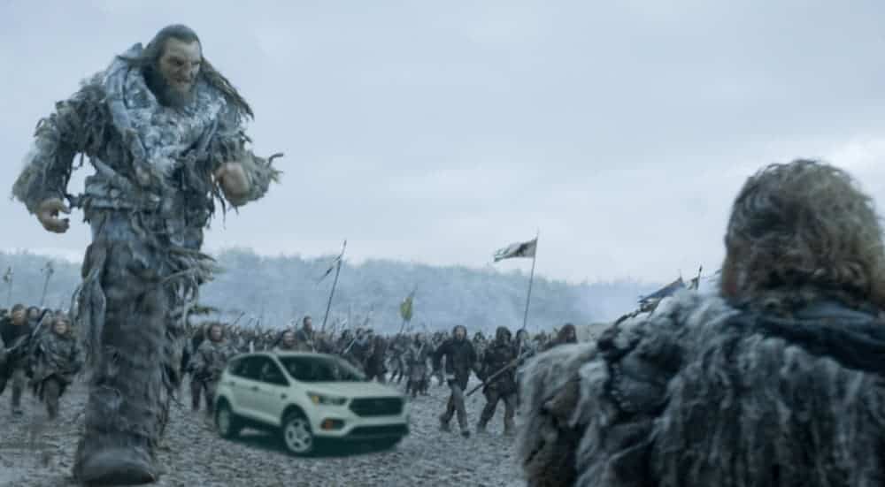 The Wildlings attack on the wall on 'Game of Thrones', alongside a Ford Escape is shown, trying to influence the 2019 Ford Escape vs 2019 Hyundai Tucson comparison.