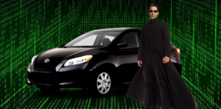 Keanu Reeves in character as NEO from 'The Matrix' films, shown next to a Toyota Matrix