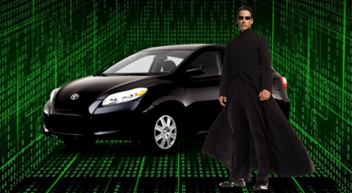 Keanu Reeves in character as NEO from 'The Matrix' films, shown next to a Toyota Matrix