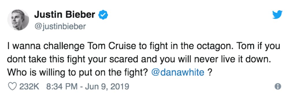 A Tweet from Justin Bieber is shown challenging Tom Cruise to a fight.