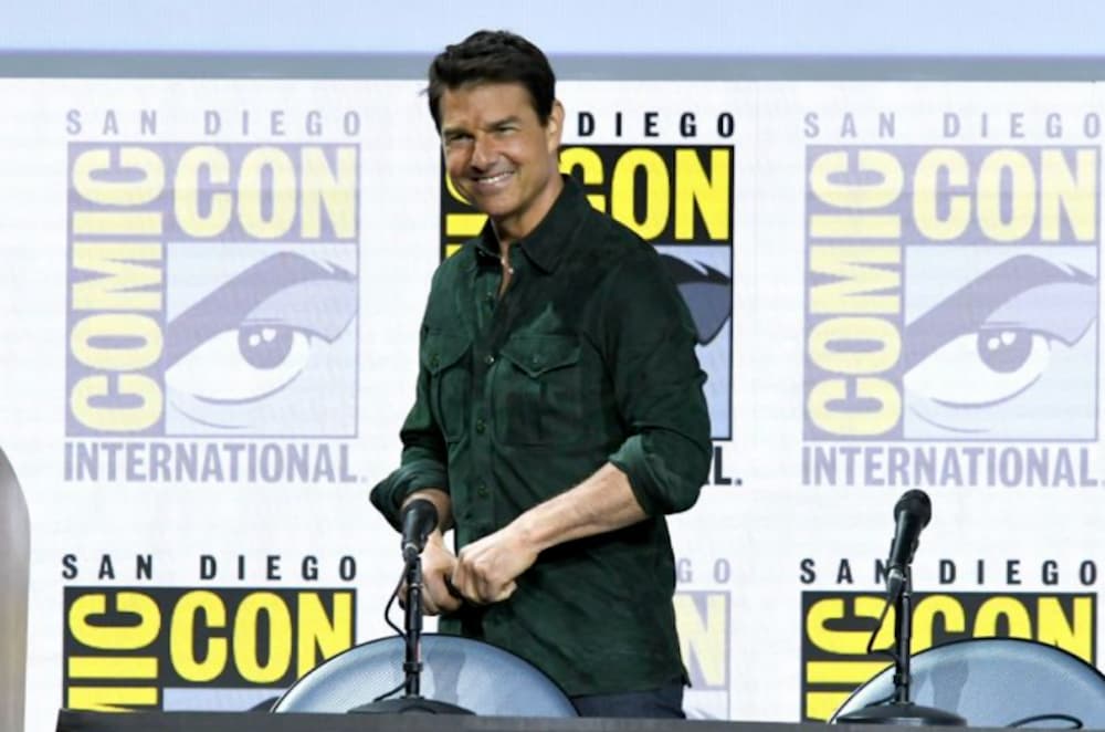 Tom Cruise is shown making a Comic Con press statement.