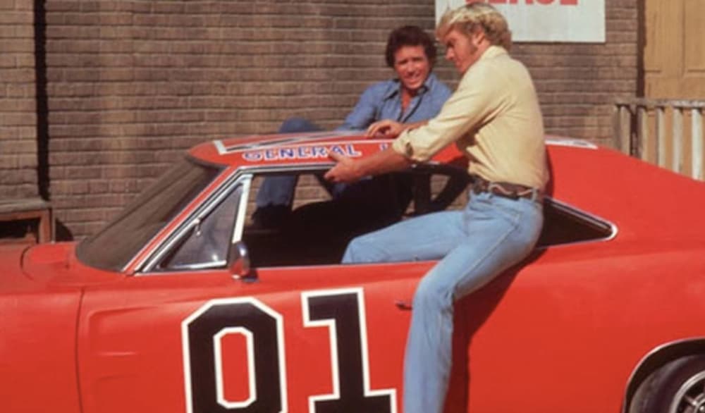 The Dukes of Hazzard boys are jumping into their General Lee.