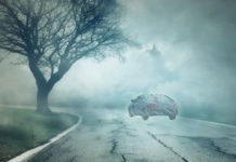 A ghost car that has been mentioned in live auto news is driving on a foggy road at night.