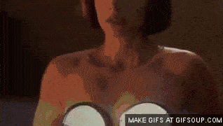 A gif of flashing lights on a woman's chest from Dumb and Dumber is shown.