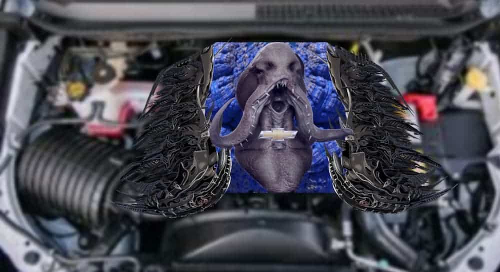 An octopus head is on the engine bay of a Chevy Colorado.
