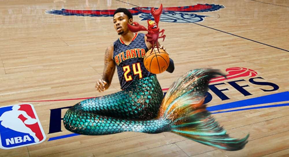 A basketball playing merman is on a basketball court.