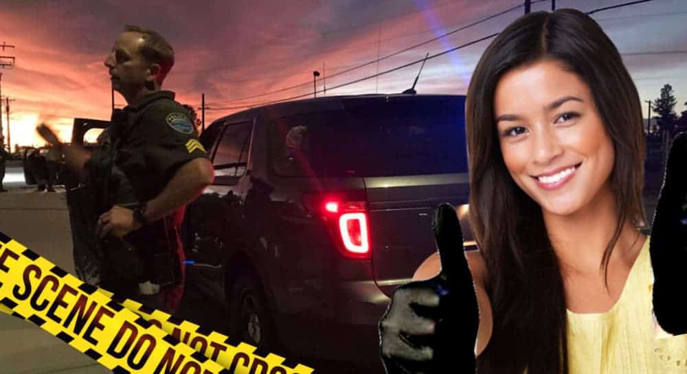 A woman is shown in front of an accident scene involving a Jeep at night.