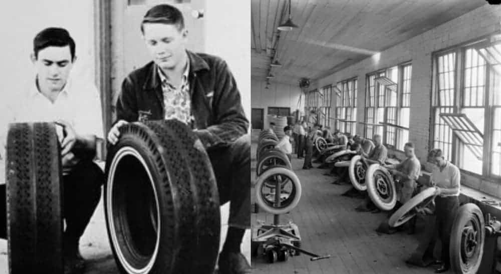 Two men are checking tires next to an old tire factory shown in black and white.