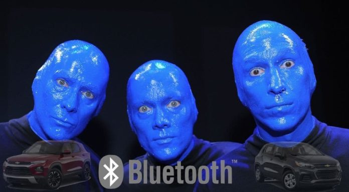 The Blue Man Group is behind the Bluetooth logo, a 2021 Chevy Trailblazer and 2020 Chevy Trax.