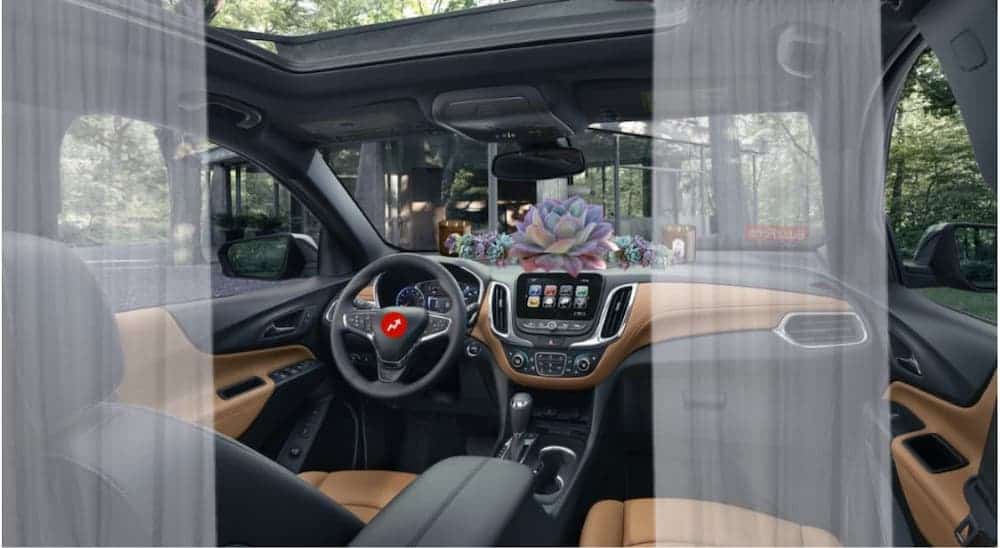 Curtains are shown inside a 2020 Chevy Equinox as part of the 2020 Chevy Equinox vs 2020 Hyundai Santa Fe comparison.