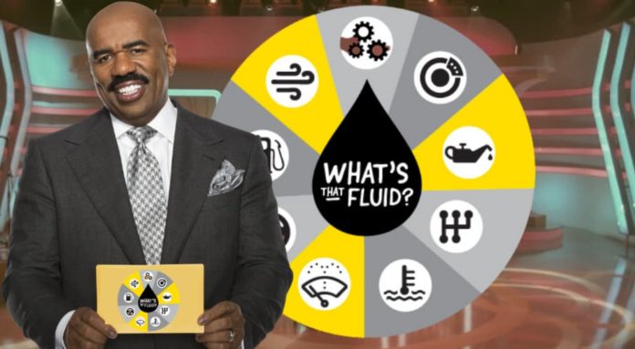 Steve Harvey hosting the game show What's That Fluid.