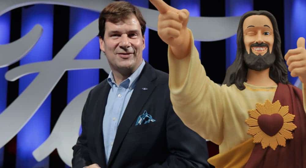 Jesus is shown winking and pointing next to Jim Farley without commenting on 2021 Ford commercial vehicle sales.