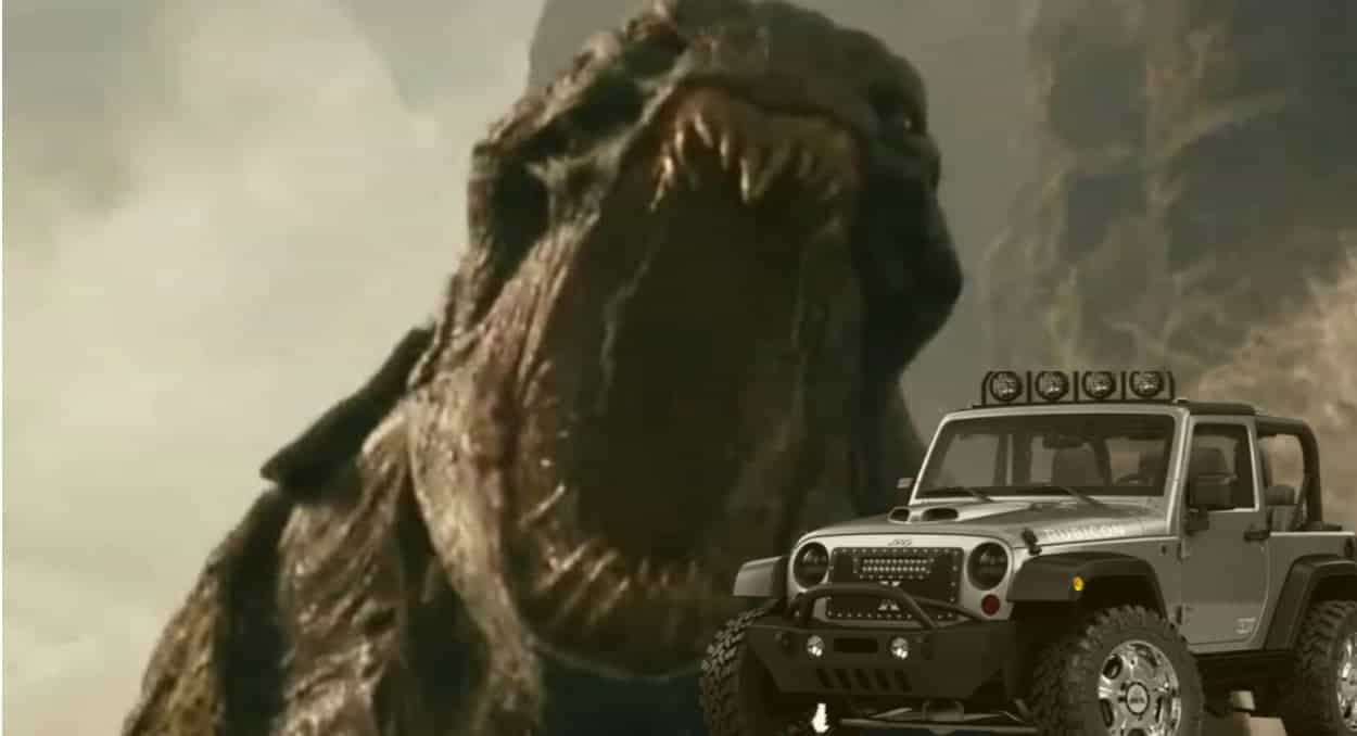 A silver Jeep Wrangler is parked in front of the Kraken from the 2012 movie Clash of the Titans.