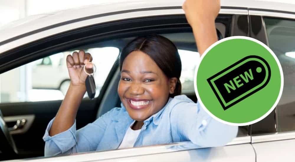 A woman in a car is holding up keys next to a green icon with a price tag on it.