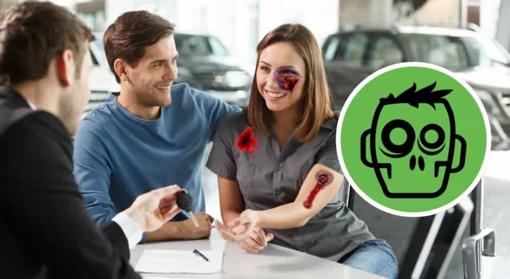 A wounded couple is talking to a salesman with a green icon with a zombie next to them.