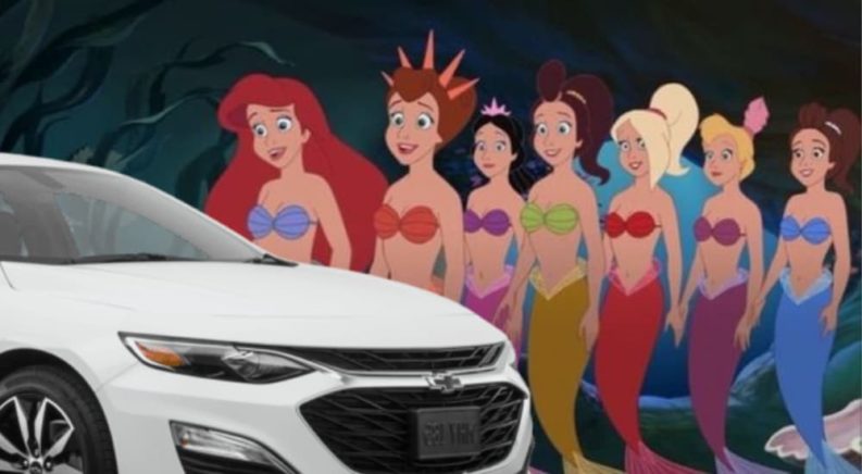 A close up shows the front of a white 2021 Chevy Malibu next to Ariel and a line of mermaids.