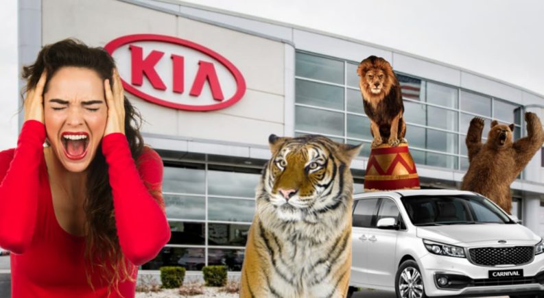 A white 2022 Kia Carnival is shown outside of a Kia dealer with a screaming woman, lion, tiger, and bear.