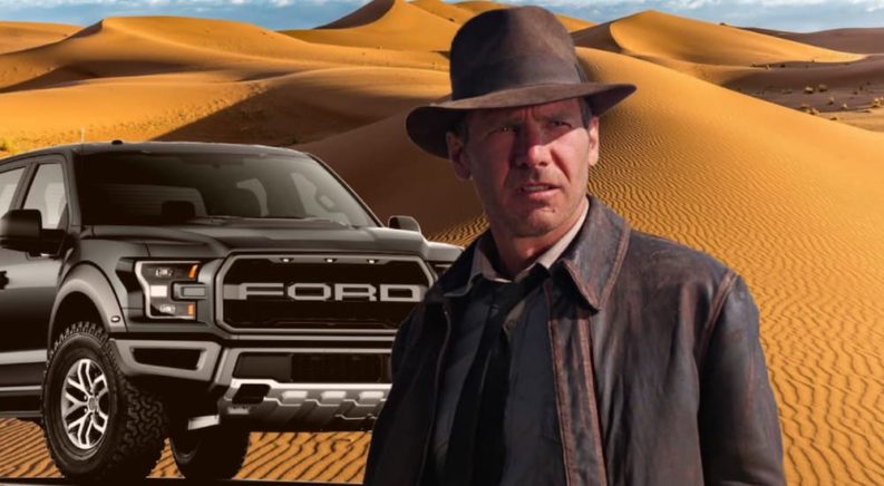 A black 2021 Ford F-150 Raptor is shown parked in the desert behind Indian Jones.