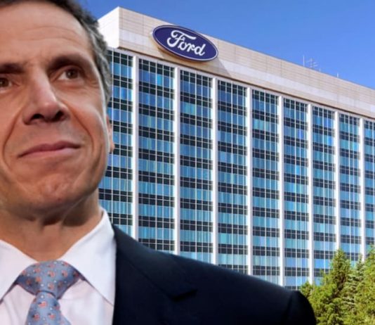Andrew Cuomo is in front of the Ford building.