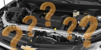 The engine of a Chevy Equinox is shown with question marks at your local used car lot.