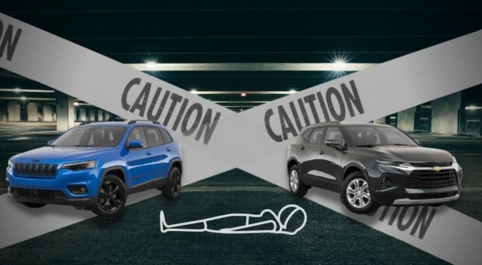 A 2021 Chevy Blazer vs 2021 Jeep Cherokee comparison is shown in front of caution tape.