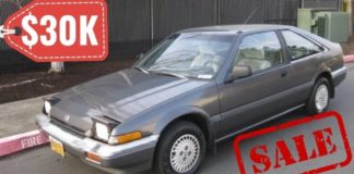 A grey car is shown with the price tag of 30K