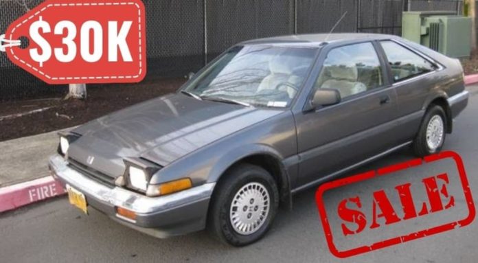 A grey car is shown with the price tag of 30K