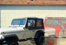 A white 1992 certified pre-owned Jeep Wrangler YJ Sahara is shown with a ghost Jeep behind it.