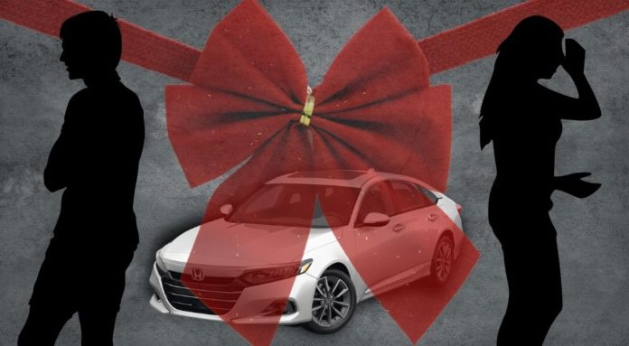 A white 2022 Honda Accord is shown with a red ribbon and a couple's silhouette.