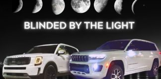 A 2022 Jeep Grand Cherokee L vs 2022 Kia Telluride during a headlight brightness competition.